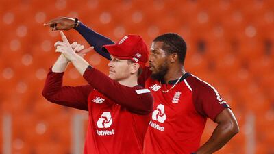 England captain Eoin Morgan, left, with Chris Jordan during India's innings of 156-6. Reuters
