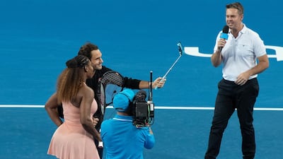 Roger Federer of Switzerland and Serena Williams of the USA take a selfie on court after playing in the mixed doubles match alongside Belinda Bencic of Switzerland and Frances Tiafoe of the USA on Day 4 of the Hopman Cup in Perth. EPA