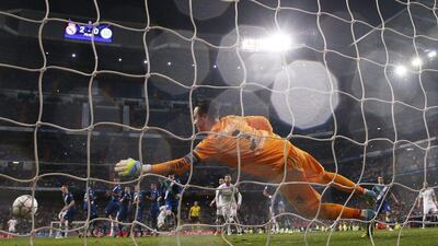 Real Madrid’s Cristiano Ronaldo scores their third goal completing his hat-trick. Reuters / Juan Medina