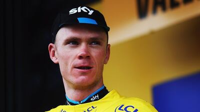 Chris Froome of Team Sky celebrates retaining the overall leaders yellow jersey at the finish of Stage 15 of the Tour de France on Sunday. Bryn Lennon / Getty Images / July 19, 2015