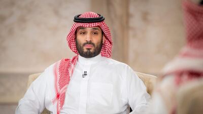 A handout picture provided by the Saudi Royal Palace on April 27, 2021, shows Saudi Crown Prince Mohammed bin Salman during an interview with the Middle East Broadcasting Center (MBC) in the capital Riyadh to mark the fifth anniversary of his vision 2030. AFP / Saudi Royal Palace