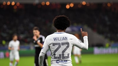 Willian celebrates scoring his second goal. Kirill Kudryavtsev / AFP