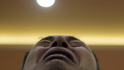 Wen Wanchang, whose son was on board the missing Malaysia Airlines Flight 370, cries as he waits for a meeting with Malaysia Airlines officials in Beijing, a day after it was announced that the search for the missing plane was over. Ng Han Guan / AP Photo