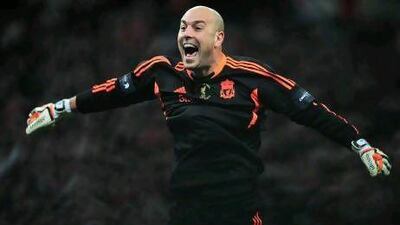 Pepe Reina celebrates after saving a penalty from Cardiff's Anthony Gerrard to win the Carling Cup in February. Glyn Kirk / AFP