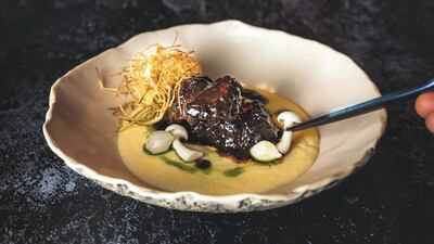 Slow-cooked beef cheeks with creamy polenta at Vakava Abu Dhabi