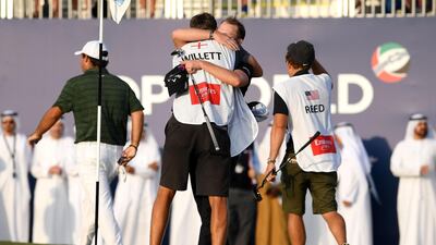 Danny Willett of England hugs his caddie, Sam Haywood following victory in the final round during day four of the DP World Tour Championship at Jumeirah Golf Estates in Dubai, United Arab Emirates. Getty Images