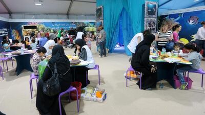 Children and parents explore the marine life section at the Abu Dhabi Science Festival. Christopher Pike / The National