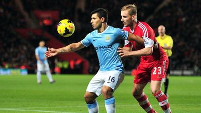 Sergio Aguero, left, scored Manchester City's lone goal on Saturday. Glyn Kirk / AFP