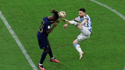 Argentina's Lionel Messi goes for a high challenge on Eduardo Camavinga of France. Getty