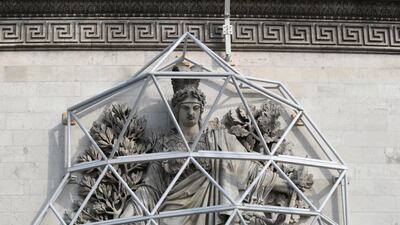 A sculpture of the Arc de Triomphe is protected during preparations for 'L'Arc de Triomphe, Wrapped'. AP