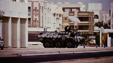 An armoured vehicle guards key installations in Dubai at the start of the Gulf War on August 17, 1990. Getty Images