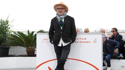Palestinian director Elia Suleiman poses during the photocall for 'It Must Be Heaven' at the 72nd annual Cannes Film Festival. The movie is presented in the Official Competition of the festival which runs from May 14-25. EPA/Ian Langsdon