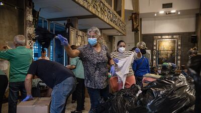 People organise donations for those affected by heavy rains, in Maracaibo, Venezuela. EPA