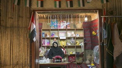 Maryam Al Mansoori sells meticulously handcrafted objects and gifts, in her kiosk called 'Shafwa' in Al Qattara Festival. Mona Al-Marzooqi / The National