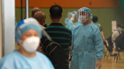 Healthcare workers at the community testing centre for the coronavirus in Hong Kong, China, September 1, 2020. Reuters