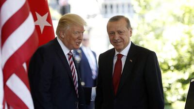 US president Donald Trump welcomes Turkish president Recep Tayyip Erdogan to the White House in Washington on May 16, 2017. The two men discussed over the phone on Saturday working more closely together to improve regional security. Pablo Martinez Monsivais / The Associated Press