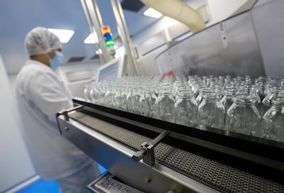 A technician works on antiviral drug remdesivir at Eva Pharma’s plant in Cairo, Egypt. Reuters