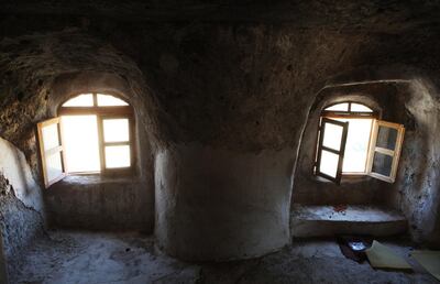 The caves of Hasankeyf's hillside used to provide its residents with shelter before the more modern facilities were built closer to the river. Galen Clark / The National