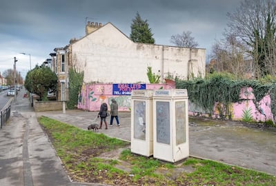Nine cream-coloured phone boxes have been granted listed status to mark their importance as 'the last in the line of classic telephone boxes'. Photo: Historic England