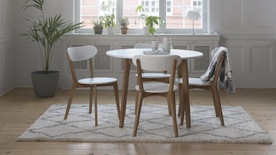 Jegind table and four chairs; Dh1,110