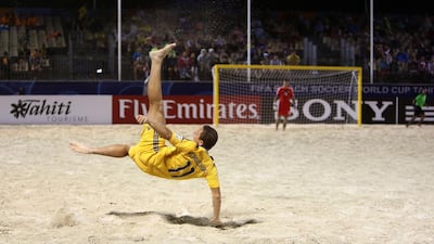 Ukraine's Oleksandr Korniichuk delivers a wheel kick during their Beach Soccer World Cup match between Ukraine and Brazil at Papeete, Tahiti. Gregory Boissy / AFP