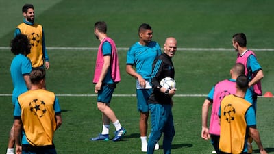 Real Madrid manager Zinedine Zidane oversees training ahead of the Uefa Champions League final. Gabriel Bouys / AFP