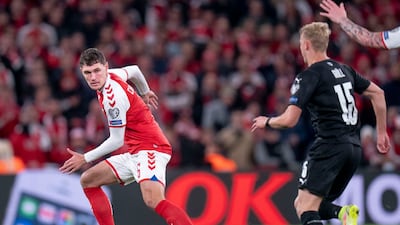 Denmark's Andreas Christensen, left, and Austria's Marco Gruell battle for the ball. AP