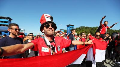 Egyptian fans cheer on their national team at the Moscow Fan Fest on Friday as they went up against Uruguay. Zurab Kurtsikidze / EPA
