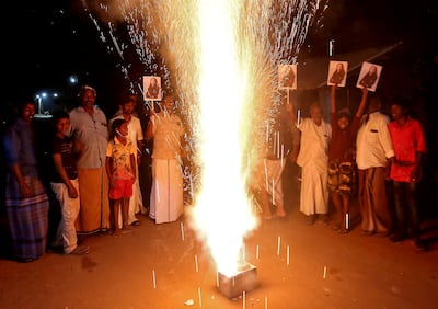 People in Thulasendrapuram, the south Indian village where Kamala Harris's grandfather was born and grew up, celebrate after she was sworn in. Reuters