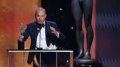 Michael Keaton receives the award for Outstanding Performance by a Male Actor in a Television Movie or Limited Series for 'Dopesick'. Reuters