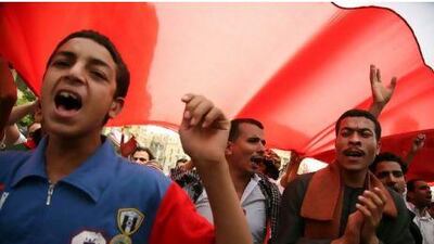 Protesters shout slogans during a demonstration in Cairo's landmark Tahrir Square yesterday.