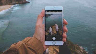 Half of UAE travellers struggle to disconnect from digital devices while on holiday. Photo: Nadine Shaabana / Unsplash