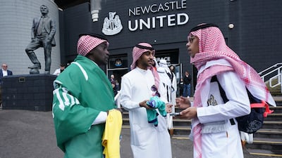 Football fans at St. James' Park on Sunday. Newcastle play their first game under new ownership after the club was bought out last week by Saudi Arabia's sovereign wealth fund. AP