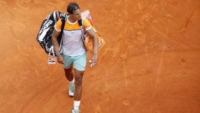 Rafael Nadal leaves the court on Saturday after losing to Novak Djokovic in the Monte Carlo Masters semi-finals. Sebastien Nogier / EPA / April 18, 2015