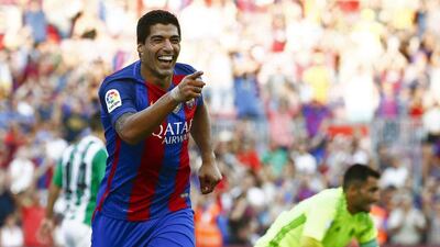 Barcelona striker Luis Suarez celebrates after scoring his second goal, the team’s fourth goal, against Real Betis during their La Liga match at Camp Nou in Barcelona, northeastern Spain, 20 August 2016. Quique Garcia / EPA
