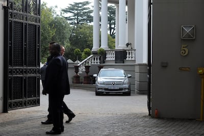 Members of the South African Asset Forfeiture Unit descended on the Guptas' heavily protected compound in the upmarket suburb of Saxonwold. AFP