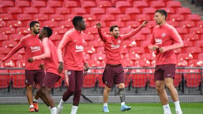 Lionel Messi and his Barcelona teammates during a training session at Wembley Stadium. EPA