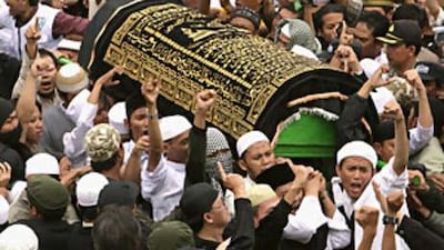 The body of Bali bomber Imam Samudra arrives for a funeral in his hometown on Nov 9 2008, in Serang, Banten, Indonesia.