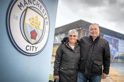 Man City fans Sue and Rob Booth got engaged at half time during a City game. Darren Robinson Photography