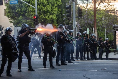 Police shoot rubber bullets at protesters in front of City Hall in Los Angeles. AFP