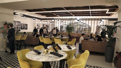 The restaurant has chosen a monochrome theme with a pop of colour. The National