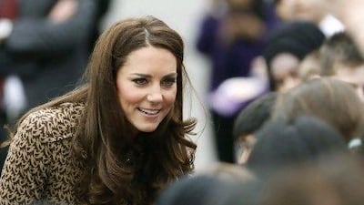 Britain's Catherine, the Duchess of Cambridge, let slip the name of her new puppy during a visit at a school in Oxford.
