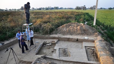 Four complete human skeletons - two men, one woman and a child - thought to date back some 5,000 years have been discovered in an ancient village in northern India. Archaeological teams from India and South Korea have been digging since 2012 in an area of Haryana state where an ancient Indus Valley civilisation was thought to have been located. Manoj Dhaka / AFP