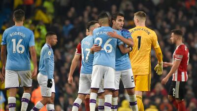 Manchester City players celebrate their victory at the end of the game. AP