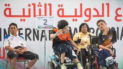 Pattaya Tadtong of Thailand throws the ball while competing against Lean Chin Kit of Malaysia, right, in the BC1 gold medal match at the Fazza International Boccia Competition in Dubai. Photo Courtesy / HHC Media