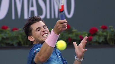 Dominic Thiem in action against Roger Federer.EPA