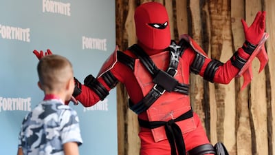 Fans attend day one of the Fortnite World Cup Finals at Arthur Ashe Stadium in the Queens borough of New York City. AFP