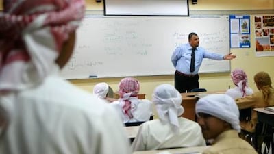 English should be the medium of instruction in public schools for mathematics and science, a reader says. Philip Cheung for The National