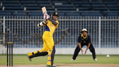 UAE cricket's Khurram Khan plays a shot for Danube Lions in the Bukhatir League final on Monday against Al Faraa. Pawan Singh / The National