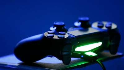 The game controller for a PlayStation 4 console. Patrick T Fallon / Bloomberg